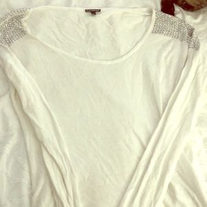 white sweater with bedazzled shoulders